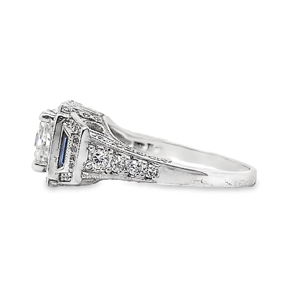 18K WHITE GOLD 6 MM PRINCESS MOISSANITE CENTER .30 CT NATURAL TRAPIZOID BLUE SAPPHIRE ACCENT .60 CT TW NATURAL ROUND BRILLIANT DIAMOND ACCENT HALO STYLE RING