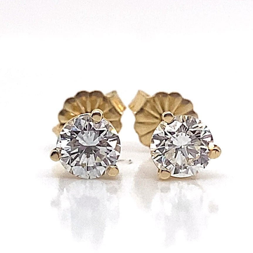 14K gold round brilliant diamond stud earrings in martini-style prong setting.