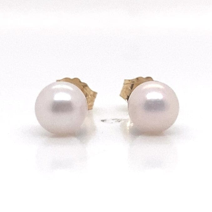 14K yellow gold stud earrings with round 5mm white pearls, classic and elegant design.