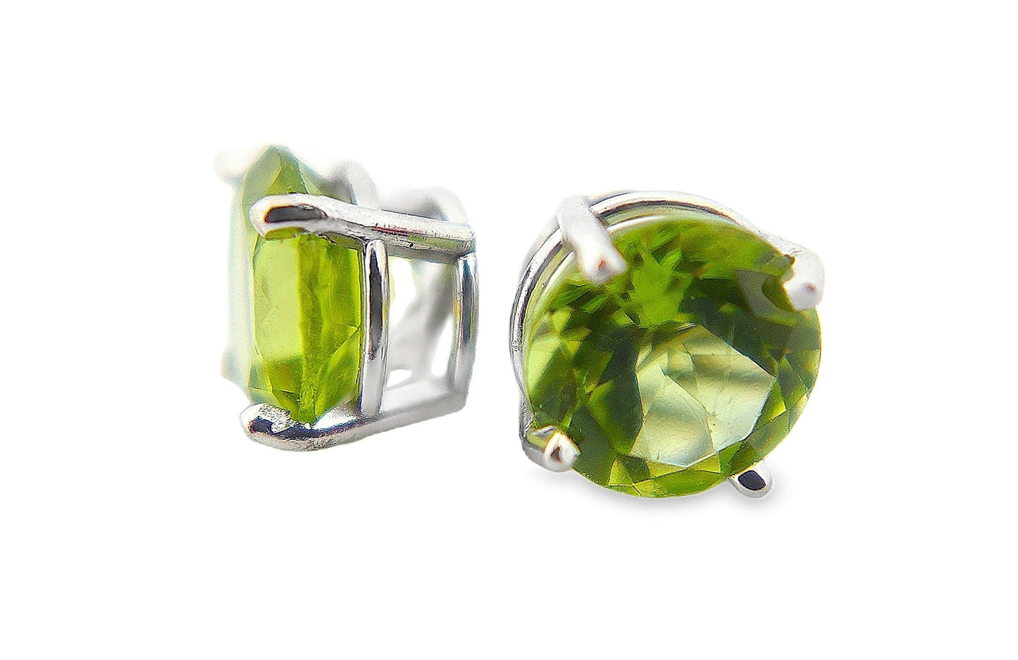7mm round peridot stud earrings set in shiny 10K white gold prong settings.