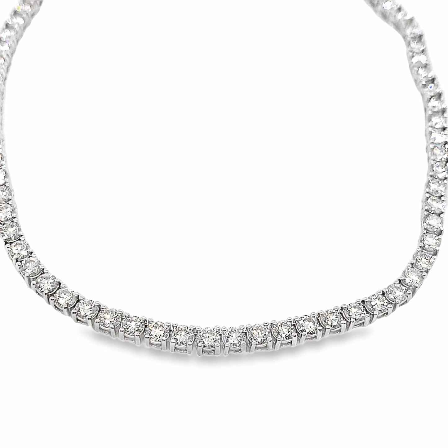 18-inch white gold diamond tennis necklace with round-cut stones, fashion accessory.