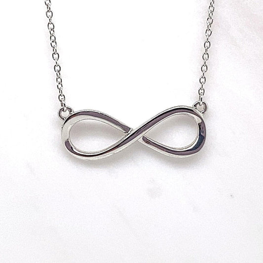14K WHITE GOLD INFINITY STYLE NECKLACE  WITH 16-18" ADJUSTABLE CHAIN