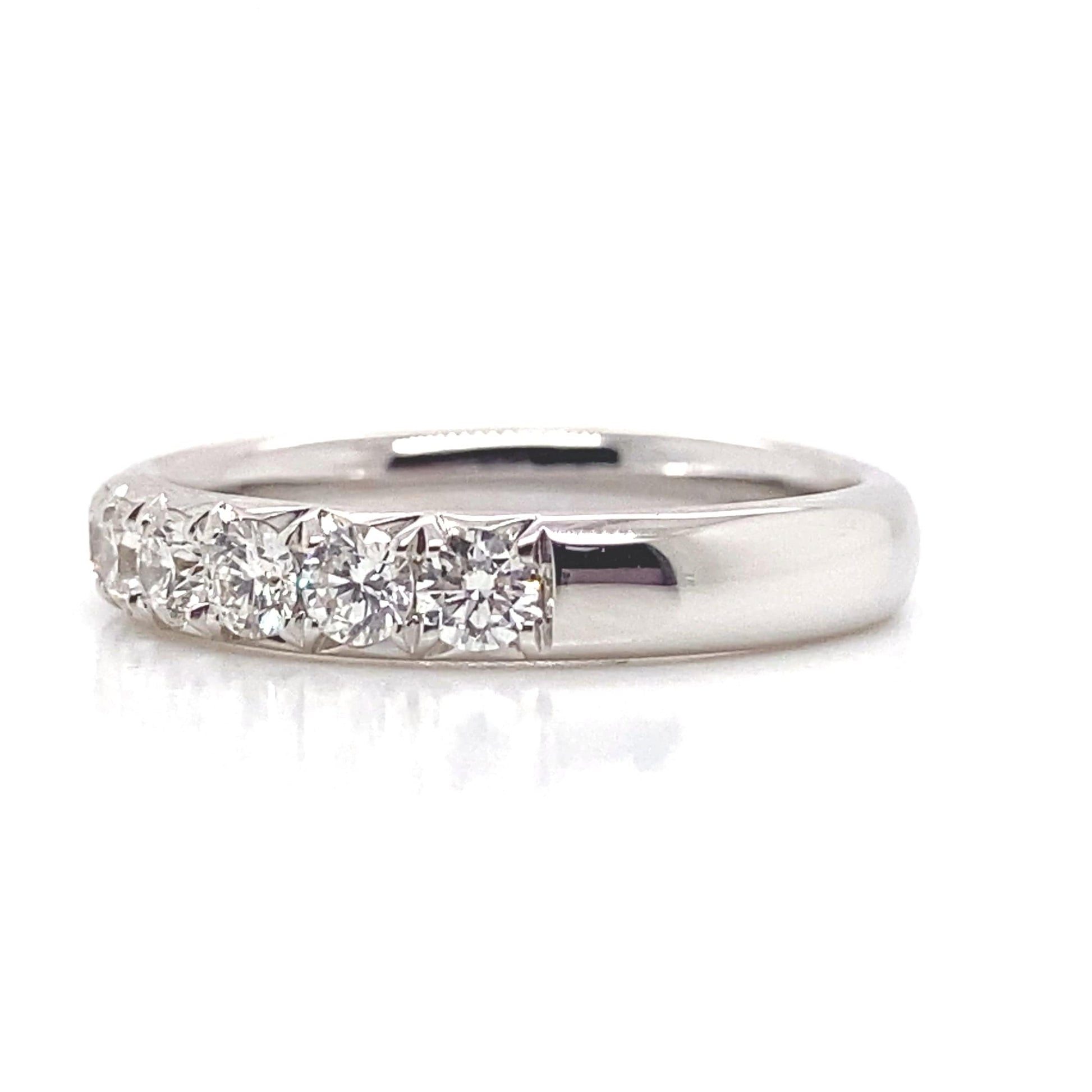 18KW .91CTW NAT RBC CUT DIAMOND F/VS FRENCH-SET BAND