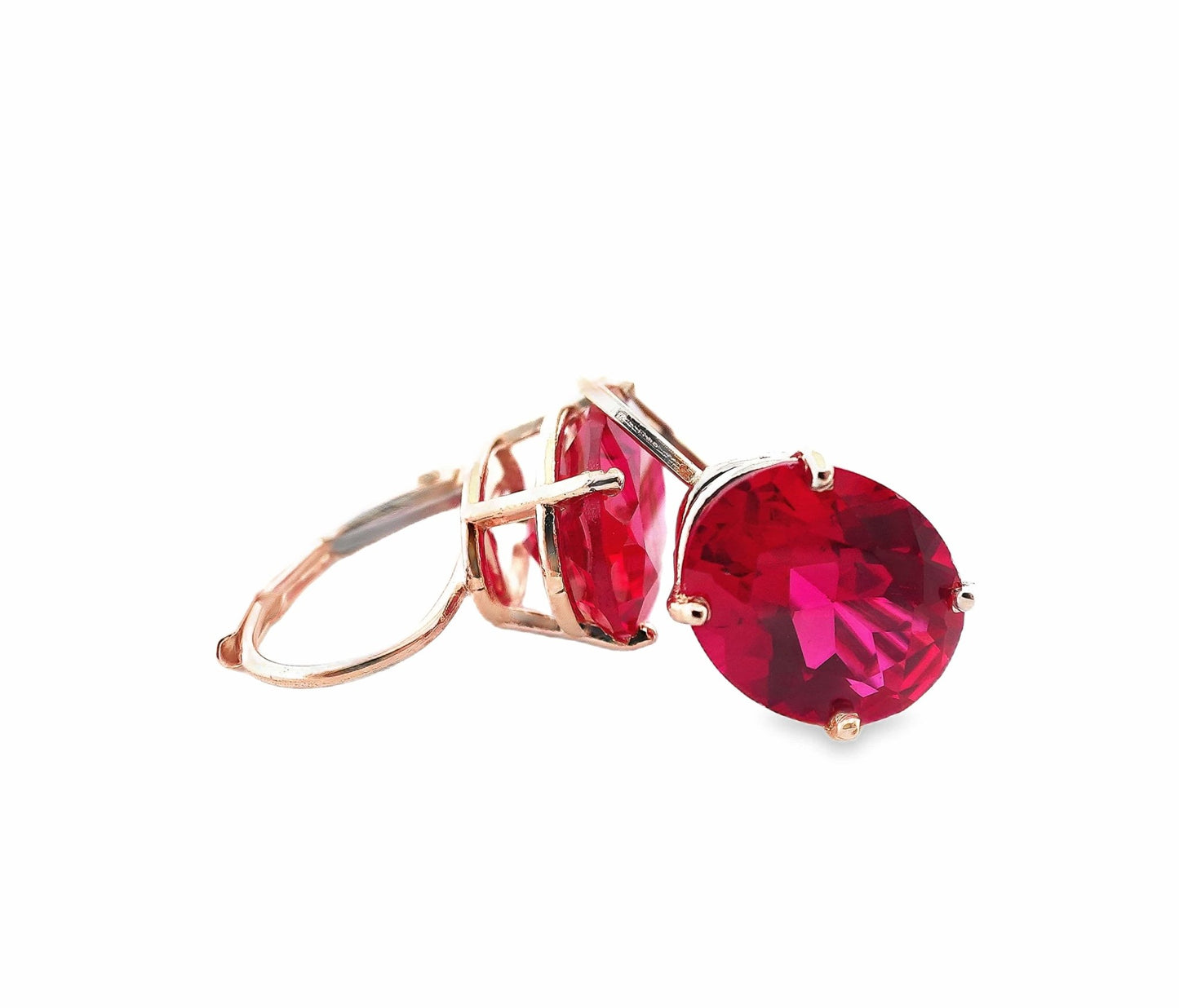 14K yellow gold lever back earrings with large oval deep red rubies.