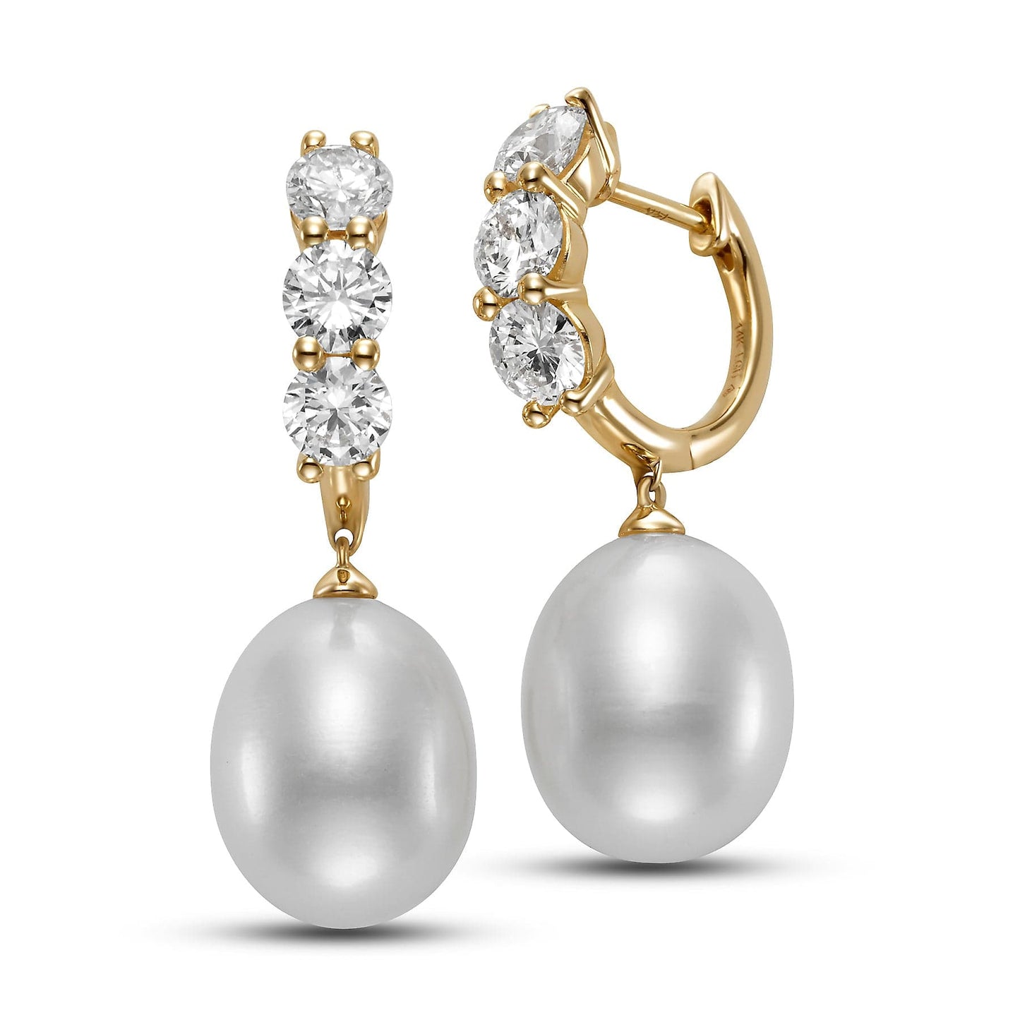 14k gold earrings with dangling white freshwater pearls and three round lab-grown diamonds each.