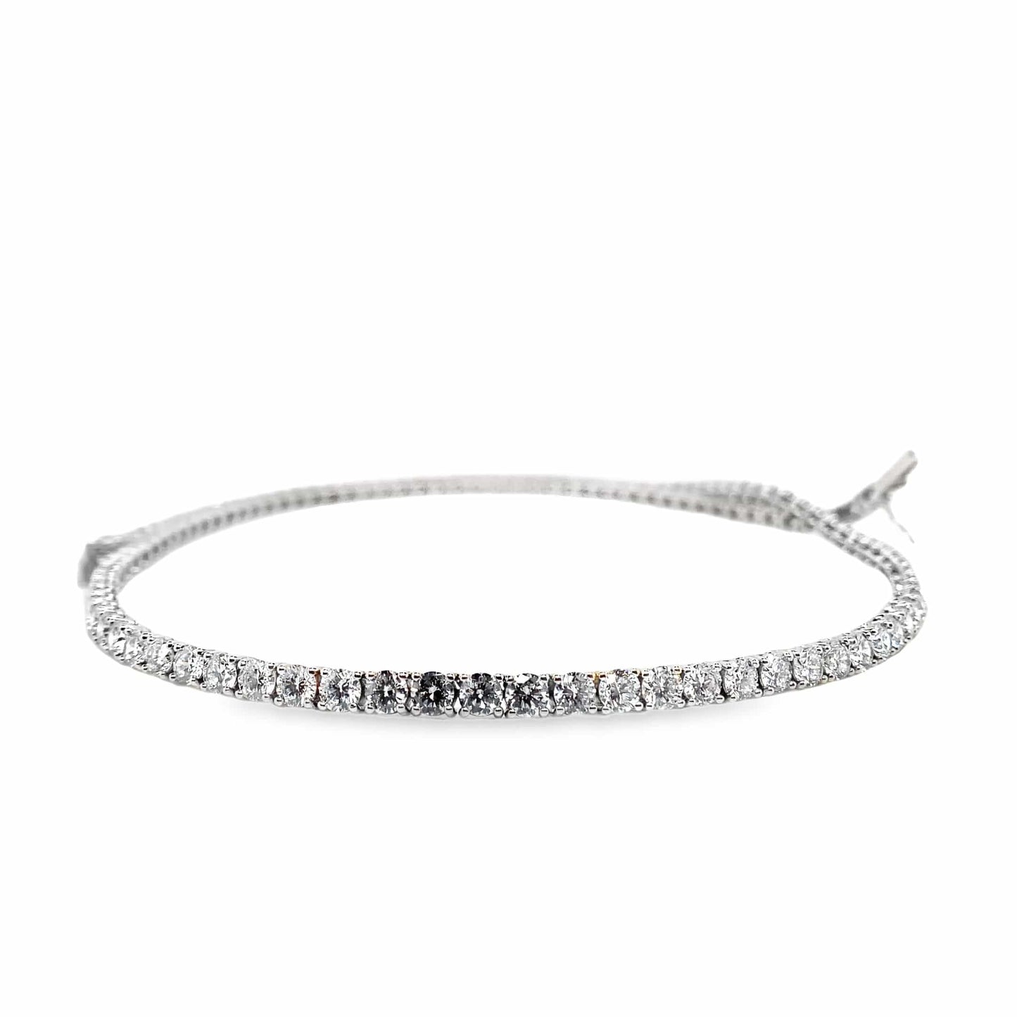 14K white gold tennis necklace with round lab-grown diamonds totaling 15.80 carats.