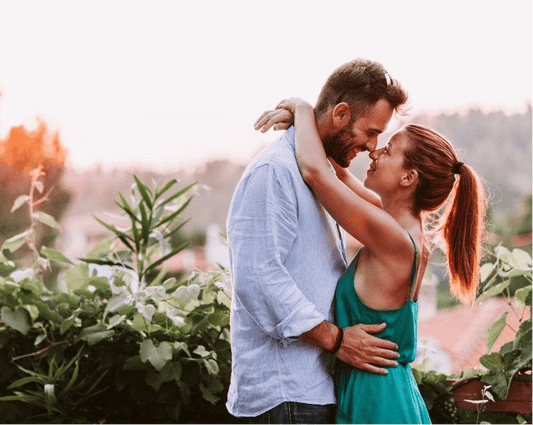couple hugging lovingly in sunset