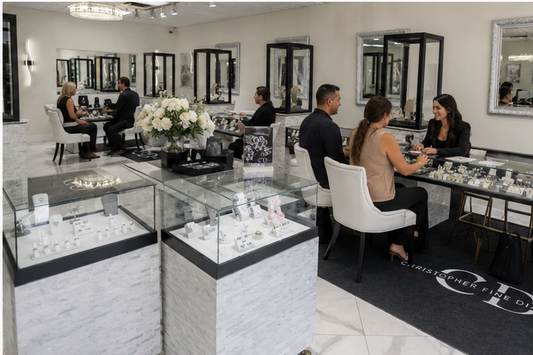 Showroom at Christopher Fine Diamonds with customers engaging with staff