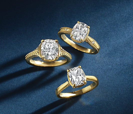 Elongated cushion cut solitaire engagement ring representing a romantic bridal trend of 2026.