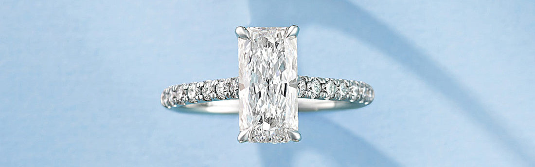 Elongated radiant cut solitaire engagement ring representing a leading bridal trend of 2026.