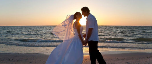 couple on beach kissing