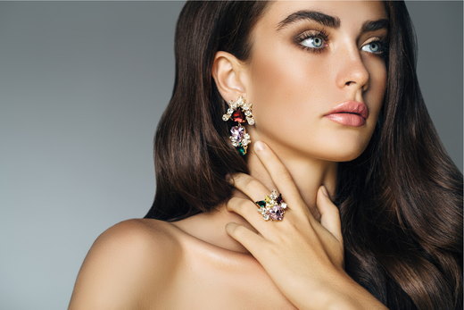 Model woman wearing various pieces of fine jewelry