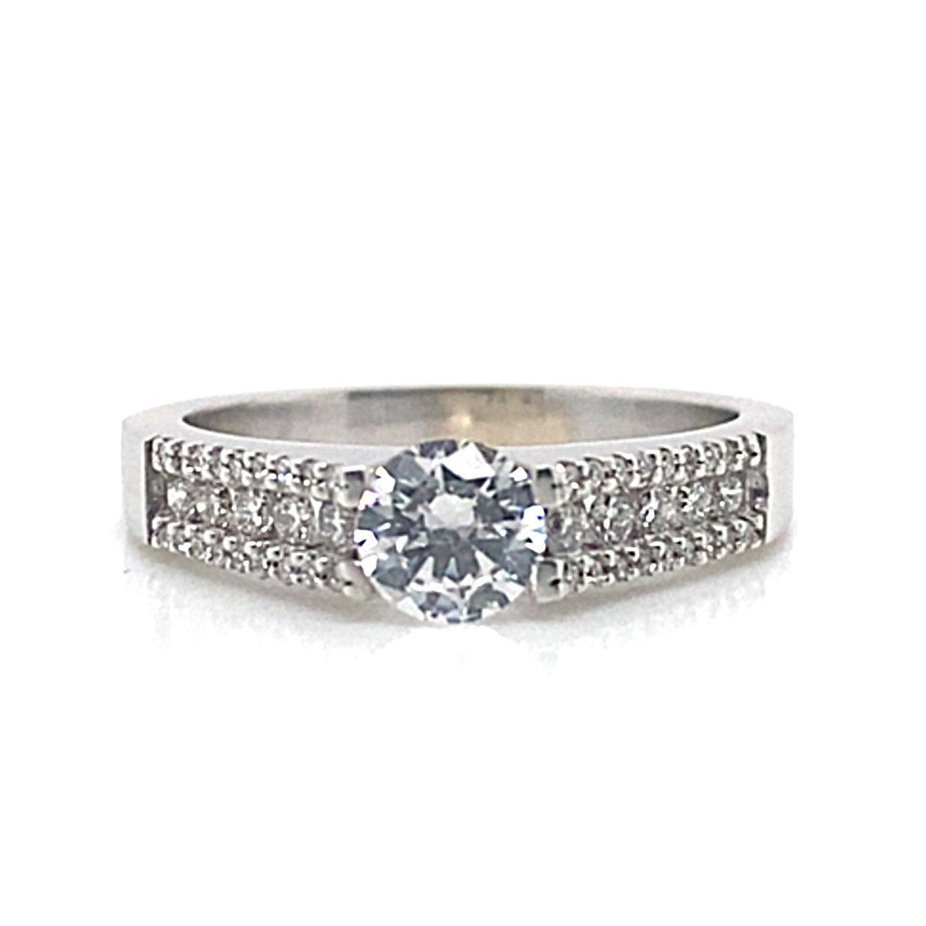 A 14K white gold ring features a dazzling 5.5mm round brilliant CZ centerpiece, enhanced with .35 carats of natural round brilliant diamond accents along the band.