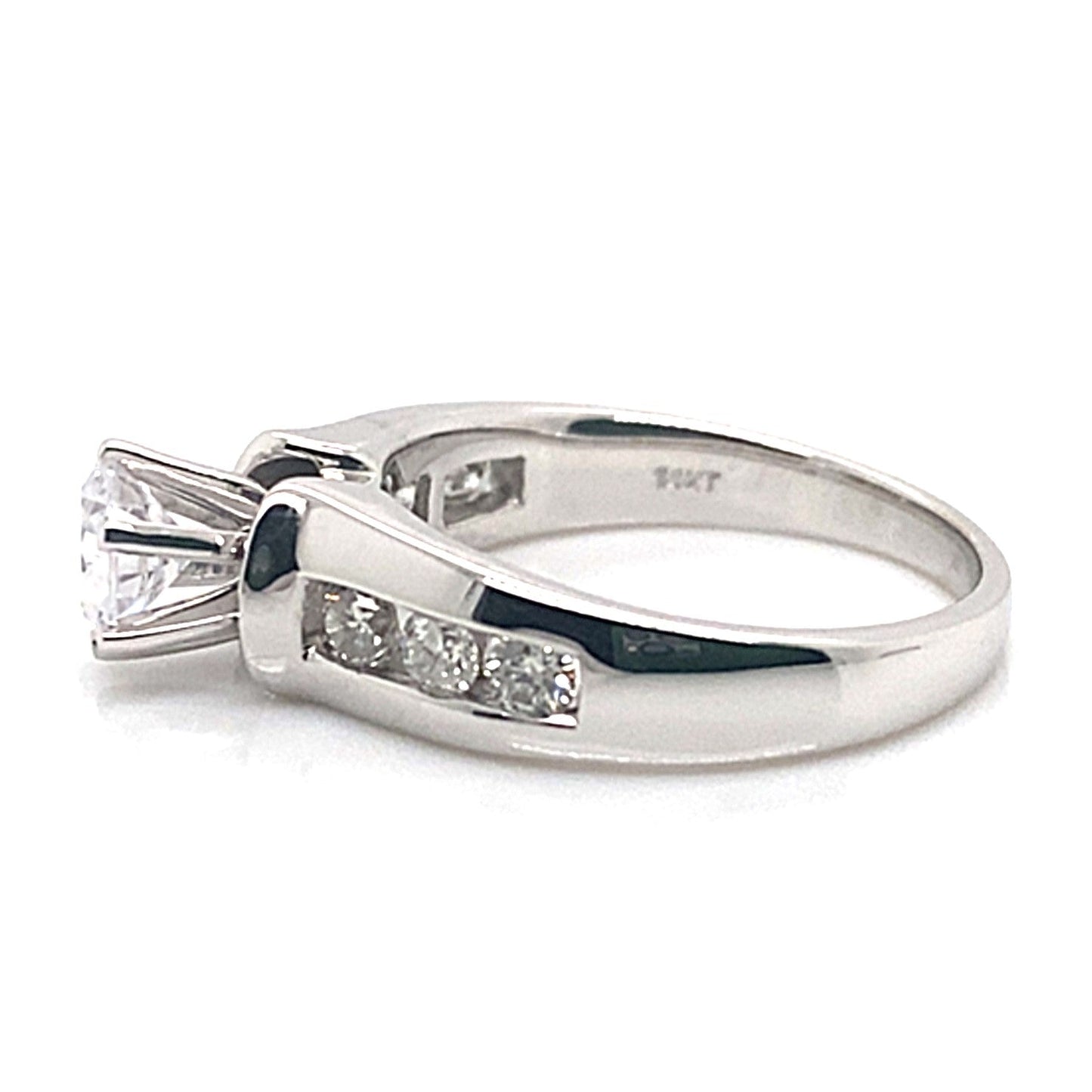 14K white gold ring featuring a dazzling channel set design with a 6mm round center and .60 carat total weight natural round brilliant diamond accents.