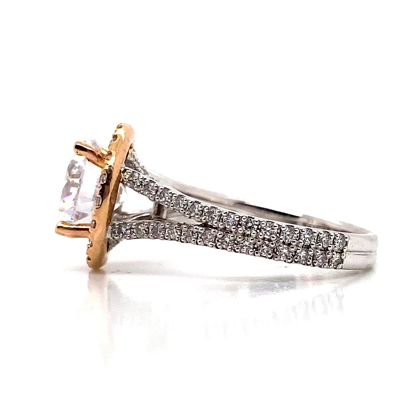 Side view of an elegant 14K gold ring showcasing a striking 9 mm cubic zirconia center in rose gold halo style, complemented by 1.10 carats total weight of natural round brilliant diamond accents on a split band.