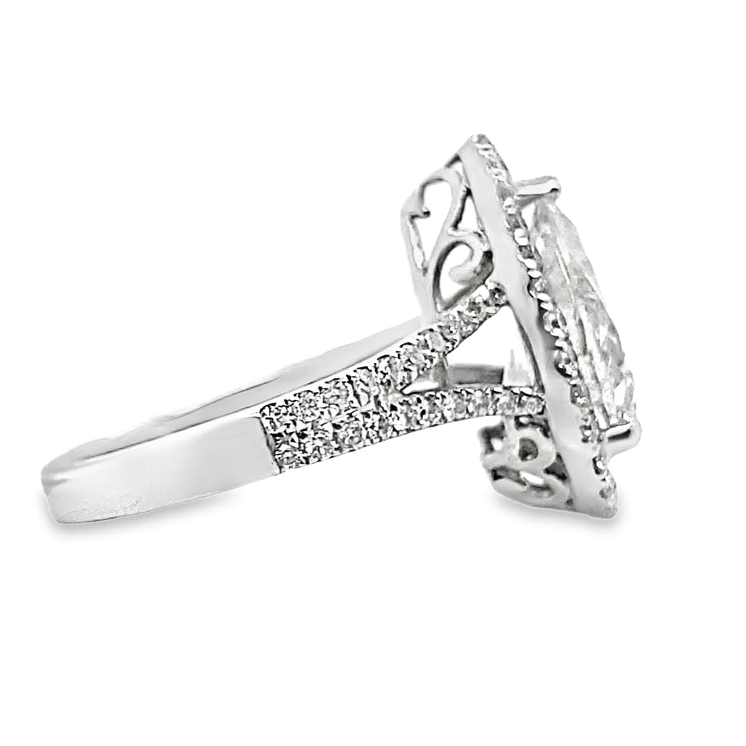 18K WHITE GOLD  2.14 CT PEAR SHAPE NATURAL DIAMOND CENTER F-G/I1  .40 CT TW NATURAL ROUND BRILLIANT DIAMOND ACCENT SPLIT SHANK HALO STYLE RING