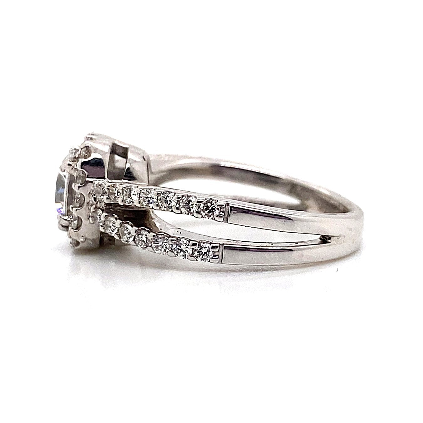 18K white gold ring with CZ center, diamond accents, cushion halo, and split shank design.