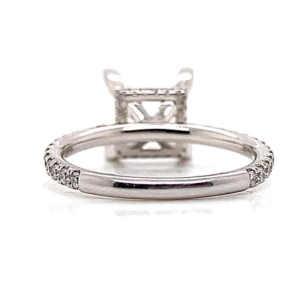 The 18K white gold no center (7 mm princess) engagement ring, featuring a hidden halo design with .50 ct total weight natural round brilliant diamond accents on the band, is displayed against a pristine white background.