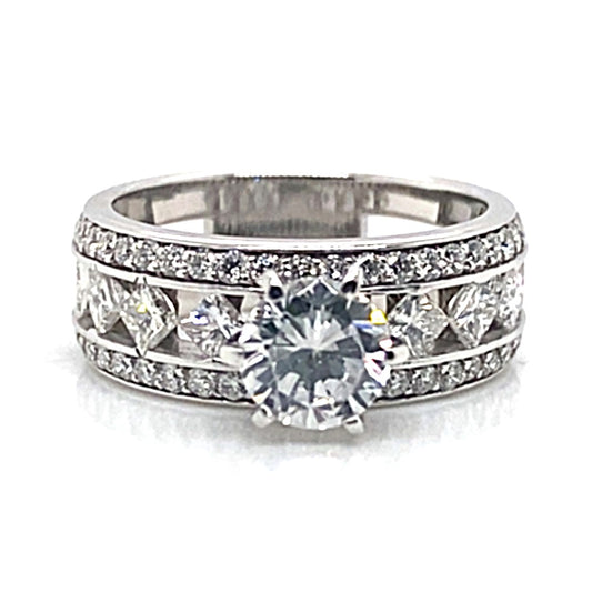 Stunning 14K white gold ring featuring a prominent 6.5 mm round brilliant cubic zirconia center stone, beautifully complemented by 1.30 carat total weight of natural round brilliant and princess diamond accents in a floating style design.