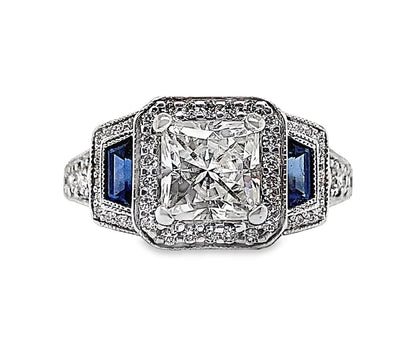 18K WHITE GOLD 6 MM PRINCESS MOISSANITE CENTER .30 CT NATURAL TRAPIZOID BLUE SAPPHIRE ACCENT .60 CT TW NATURAL ROUND BRILLIANT DIAMOND ACCENT  HALO STYLE RING