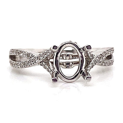 18K white gold infinity style ring featuring an oval setting with no center stone, adorned with natural round brilliant diamond accents, exuding timeless beauty.