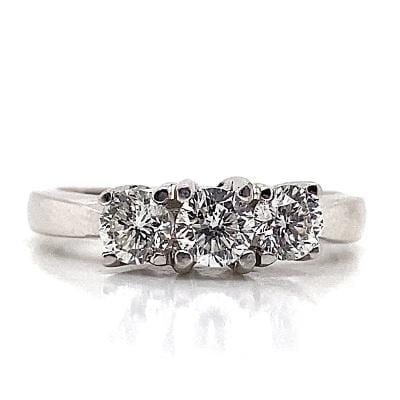 18K WHITE GOLD SHANK WITH PLATINUM PRONGS .77 CT TW NATURAL ROUND BRILLIANT DIAMONDS G/SI1-2 THREE STONE STYLE RING