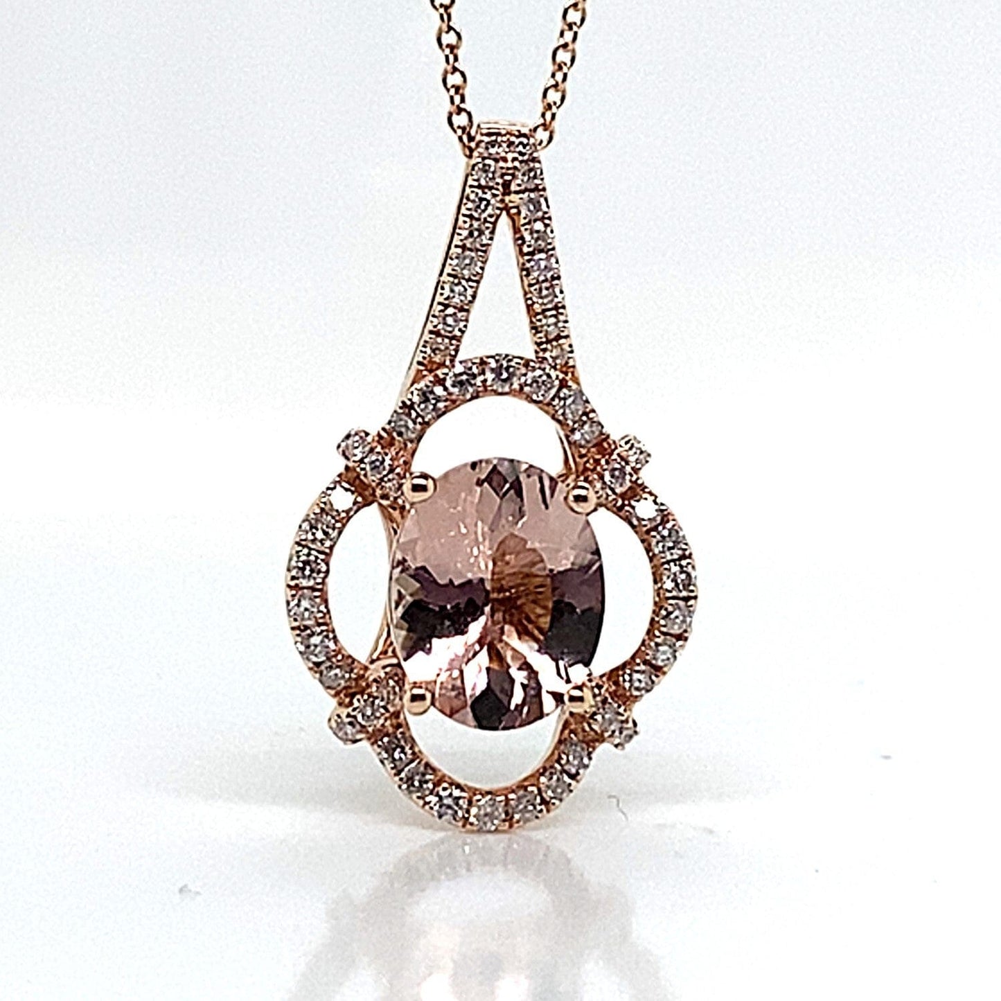 14K ROSE GOLD 2.25 CT OVAL MORGANITE CENTER .44 CT TW NATURAL ROUND BRILLIANT DIAMOND PENDANT WITH CHAIN