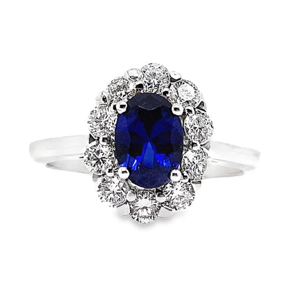 14K WHITE GOLD 7X5 MM OVAL LAB BLUE SAPPHIRE 3/4 CT TW NATURAL ROUND BRILLIANT DIAMOND ACCENT CLUSTER RING