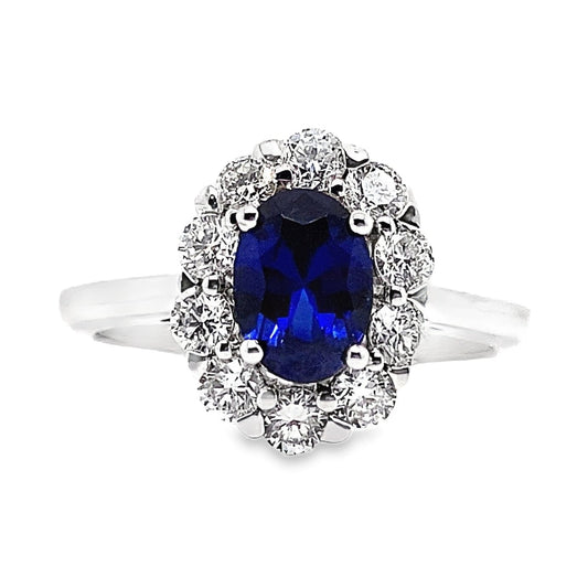 14K WHITE GOLD 7X5 MM OVAL LAB BLUE SAPPHIRE 3/4 CT TW NATURAL ROUND BRILLIANT DIAMOND ACCENT CLUSTER RING