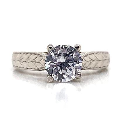 PLATINUM CZ CENTER (7 MM RBC) HAND CARVED LEAF ENGRAVED SHANK STYLE RING