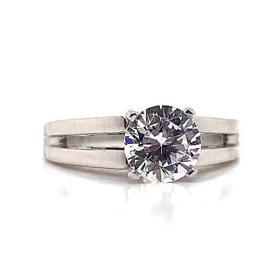 The 14K White Gold CZ Center Split Style Solitaire Ring showcases a striking round diamond (7mm RBC) set in an elegant split shank band, beautifully displayed on a white background.