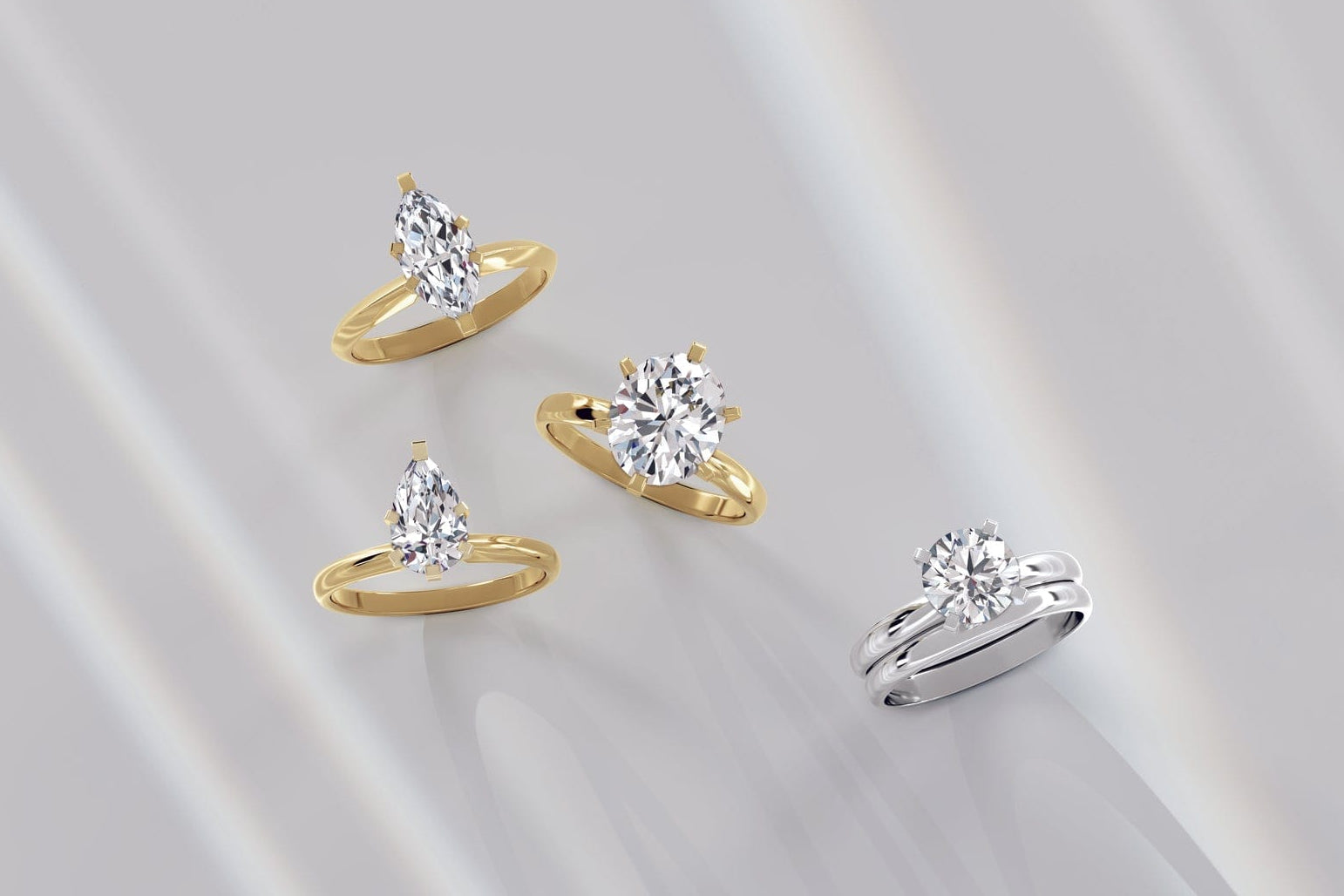 Marquise cut solitaire diamond engagement ring, pear cut diamond engagement ring, oval cut diamond engagement ring and round diamond solitaire engagement ring