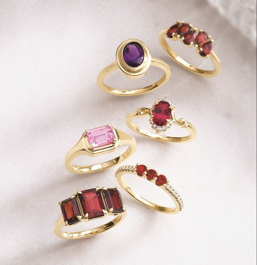 ruby gemstone rings on a light background