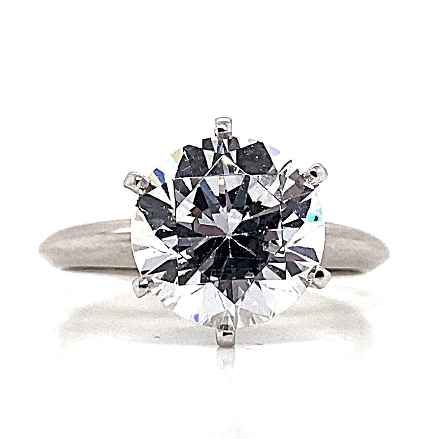 A 14K white gold ring with a 9mm round brilliant cut CZ, designed in the timeless Tiffany style solitaire setting.