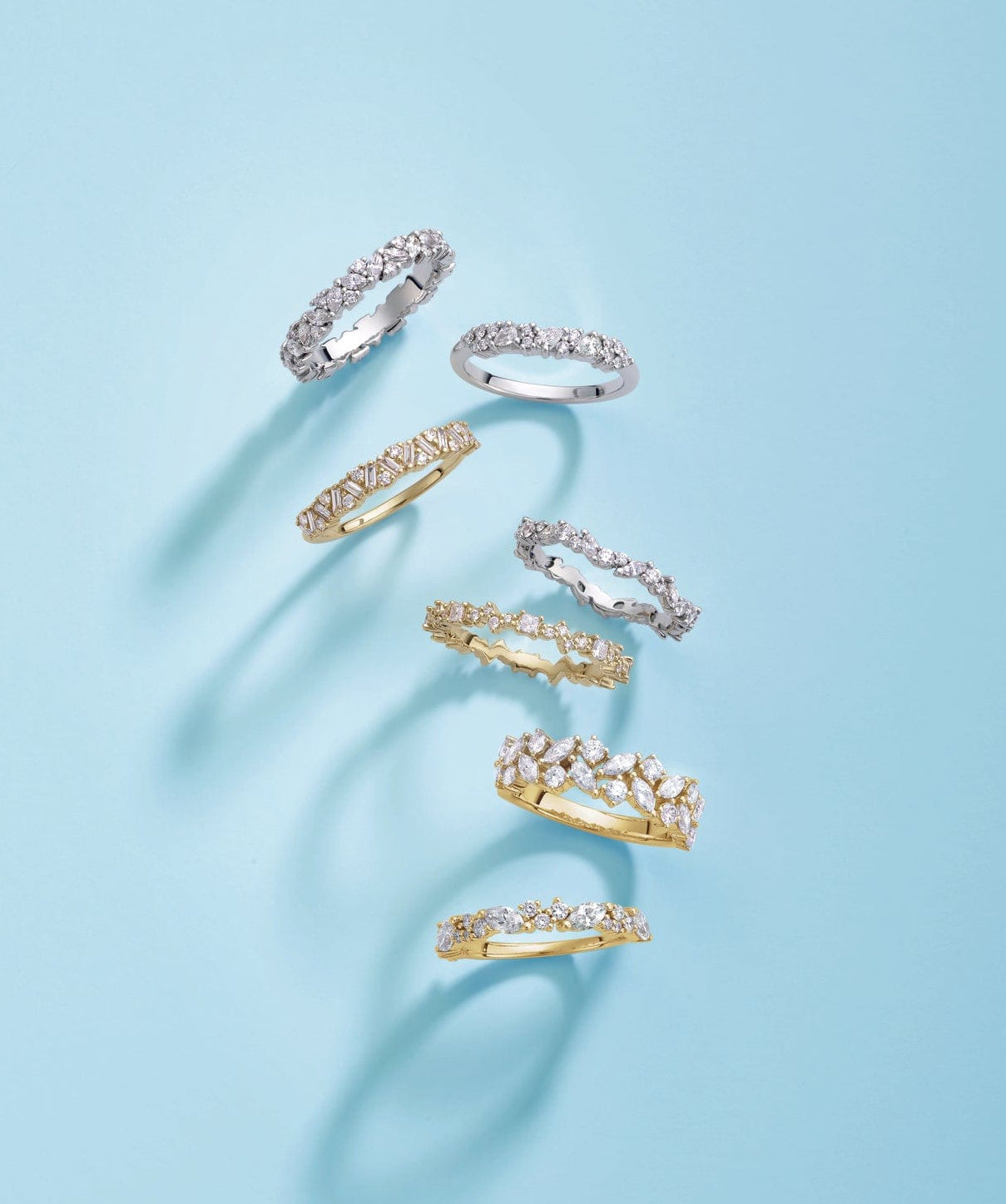 set of gold and white gold anniversary bands