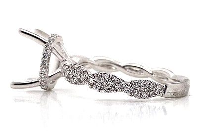 18K white gold ring, infinity hidden halo style with .50 CT natural diamond accents and a 4-prong setting.