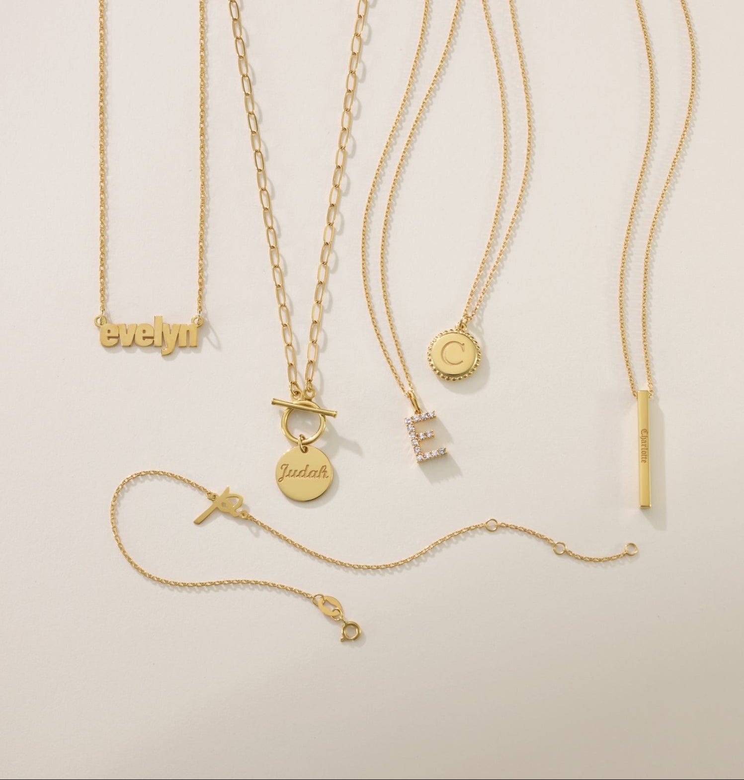 nameplate and  initial necklaces