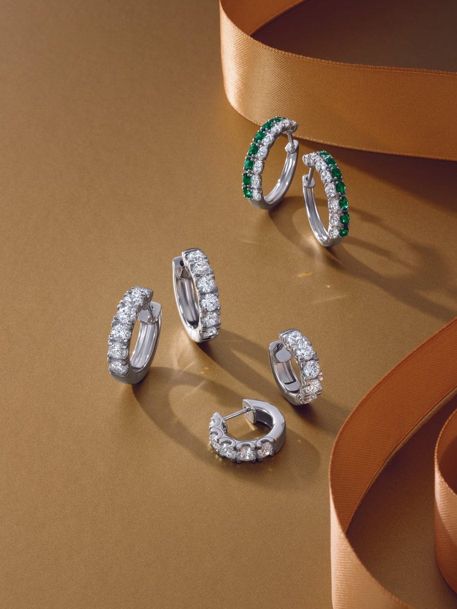 various pairs of diamond hoop earrings