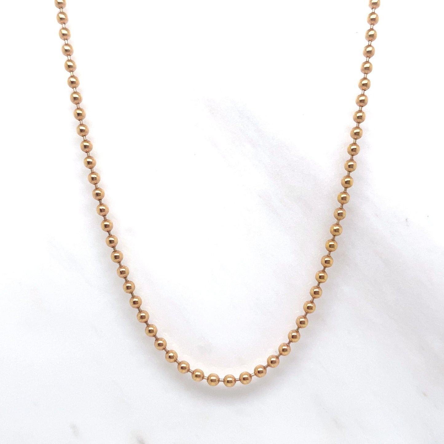 26-inch 14K Rose Gold bead chain necklace, weighing 8.8 grams, set against a white background.