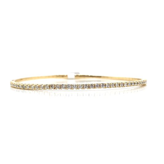 A 14K yellow gold bangle bracelet featuring .98 carats total weight of natural round brilliant diamonds arranged in a continuous row on a white background, highlighting the elegance of a 14K Yellow Gold Natural Diamond Flex Bracelet.