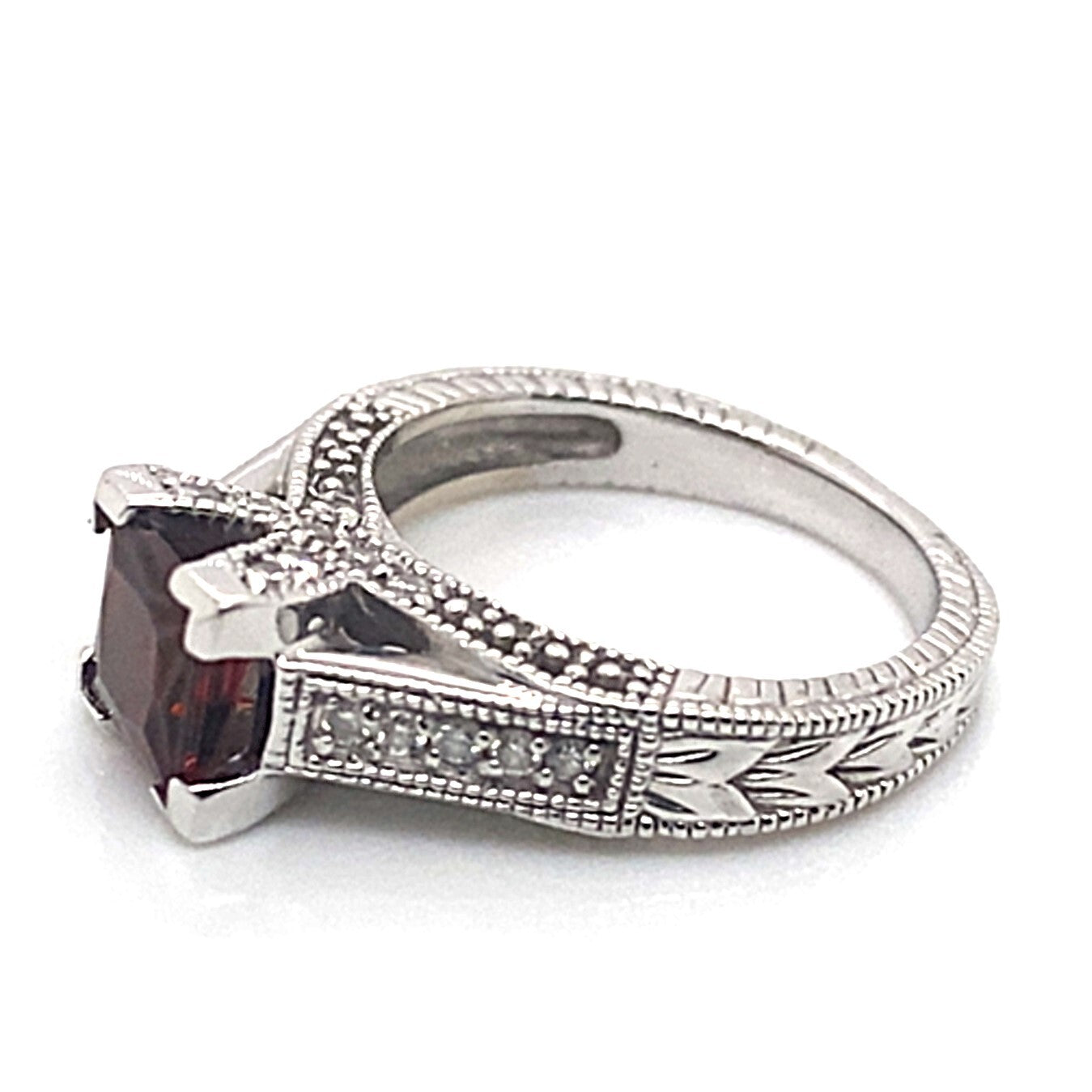 14k white gold 6.5mm square mozambique garnet center  1/4ct tw natural round brilliant diamond accent ring with an engraved shank