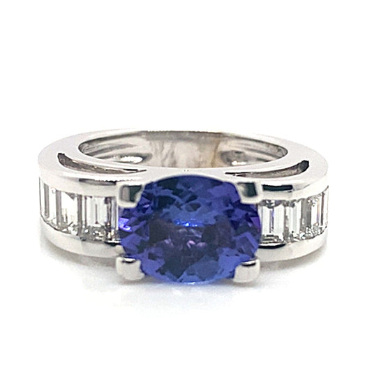 14K WHITE GOLD 2.28 CT OVAL TANZANITE CENTER AAA QUALITY 1.35 CT TW NATURAL BAGUETTE DIAMOND ACCENT FASHION RING