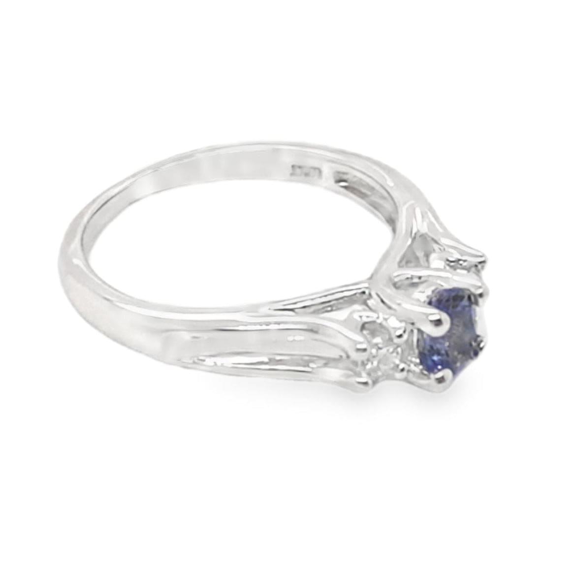 10K WHITE GOLD 1/4 CT OVAL TANZANITE CENTER .12 CT TW NATURAL ROUND BRILLIANT DIAMOND 3 STONE STYLE RING