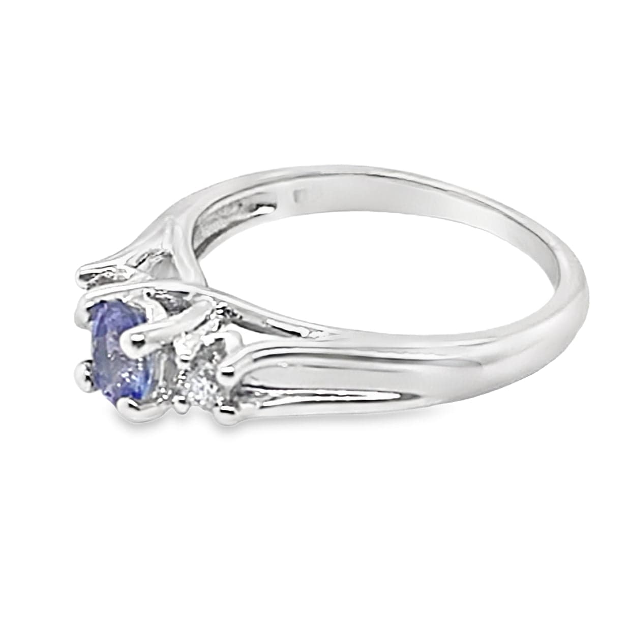 10K WHITE GOLD 1/4 CT OVAL TANZANITE CENTER .12 CT TW NATURAL ROUND BRILLIANT DIAMOND 3 STONE STYLE RING