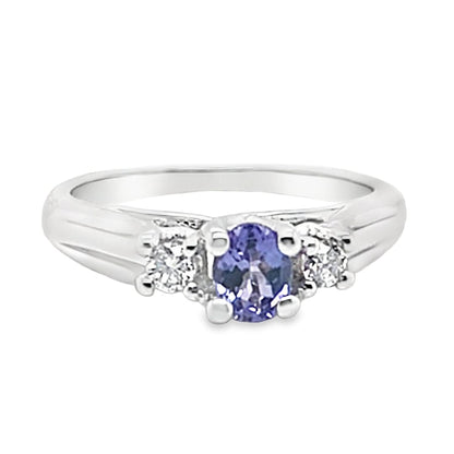 10K WHITE GOLD 1/4 CT OVAL TANZANITE CENTER .12 CT TW NATURAL ROUND BRILLIANT DIAMOND 3 STONE STYLE RING