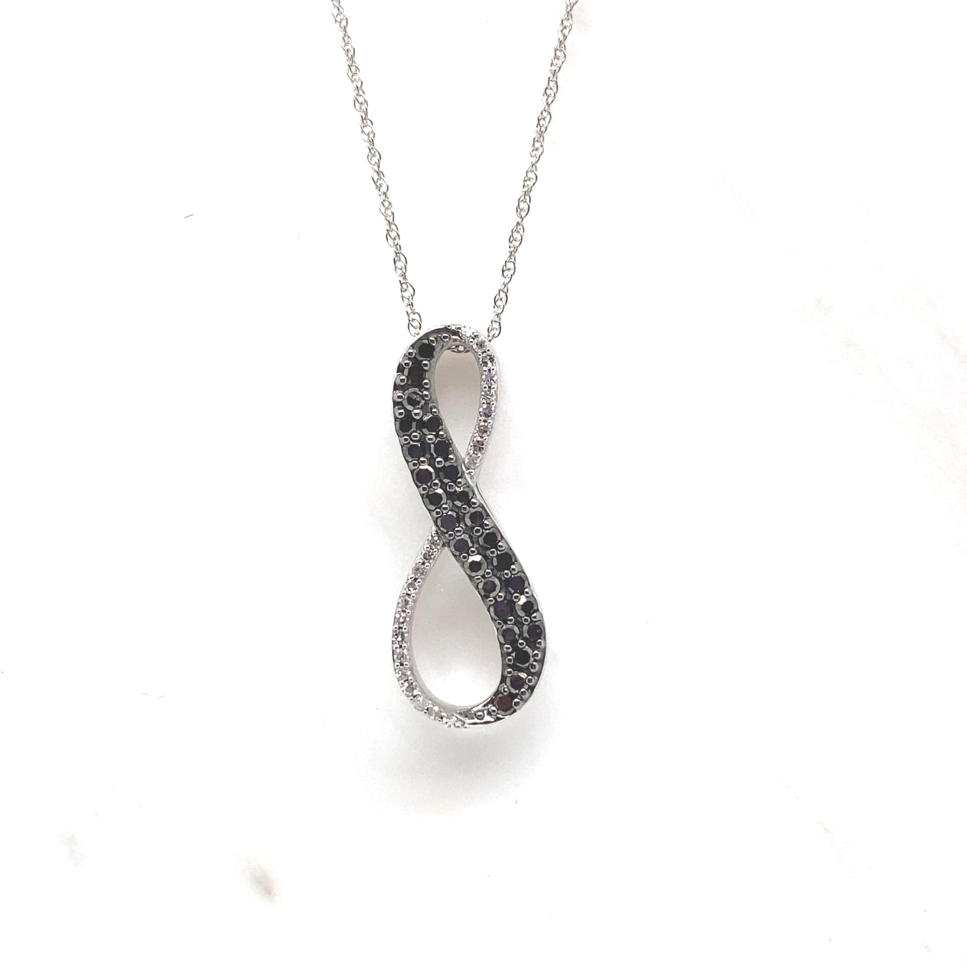 10K WHITE GOLD 1/2CT TW BLACK AND WHITE NATURAL DIAMOND INFINITY PENDANT