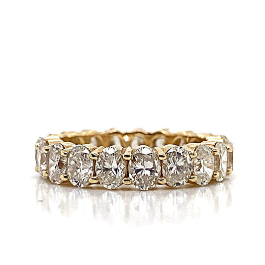 18K YELLOW GOLD 4.15 CT TW OVAL SI1/I ETERNITY BAND