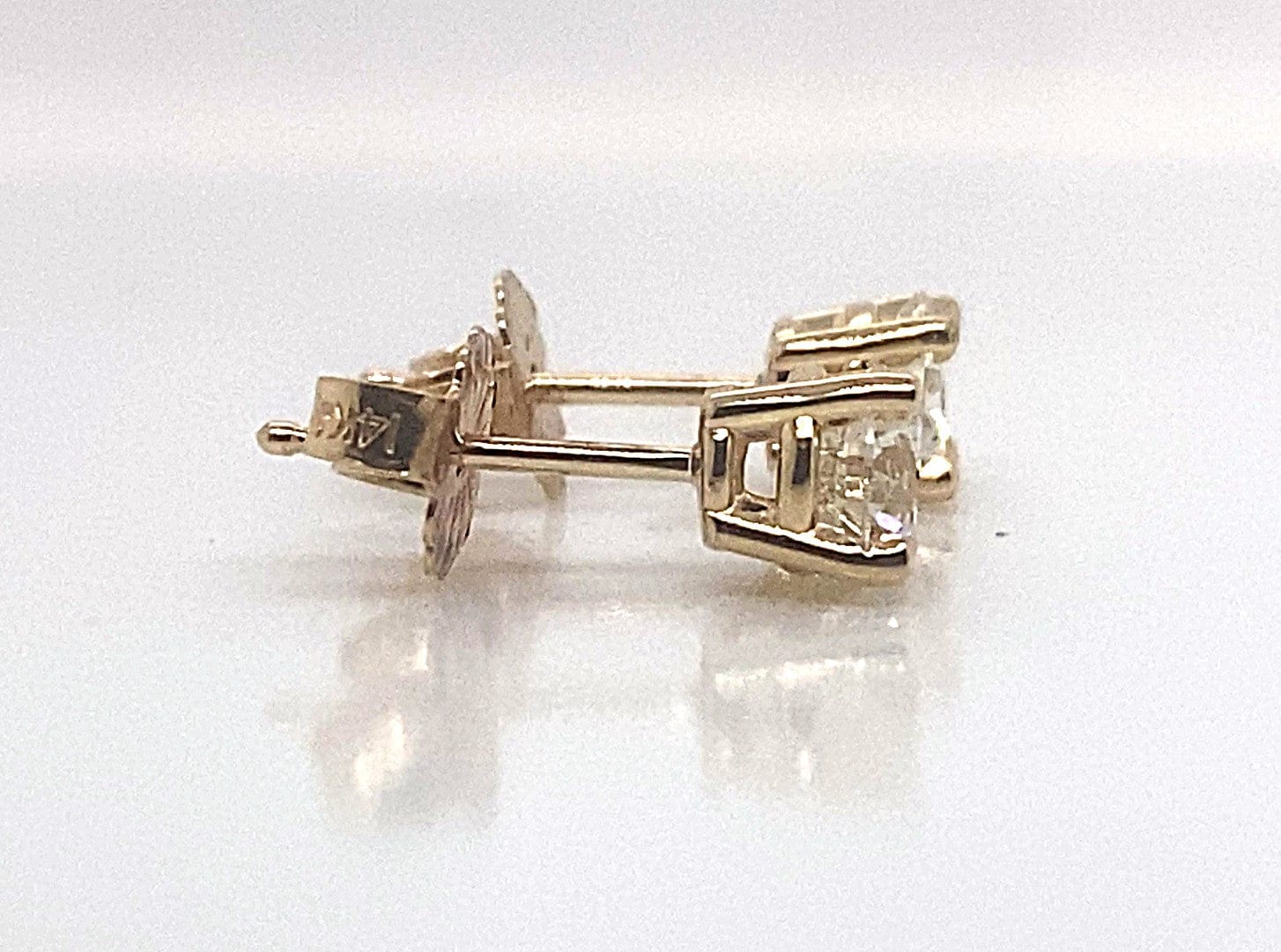 14KY .68CTW NATURAL ROUND DIAMOND STUD EARRINGS