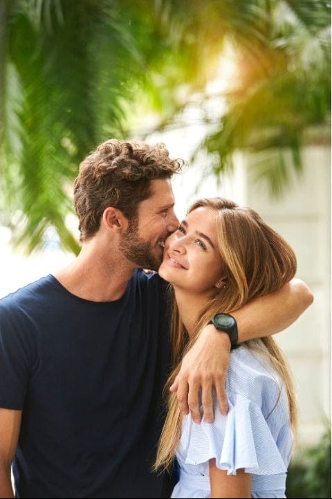 happy couple with promise ring