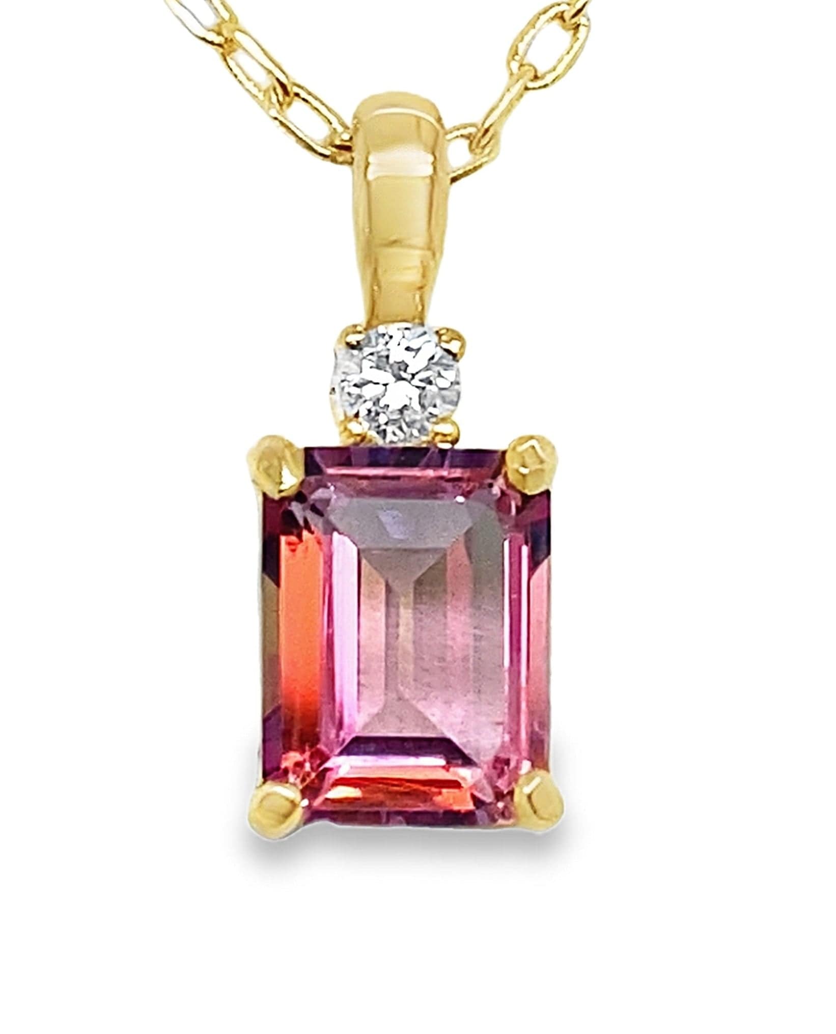 14KY 9X7MM EMERALD CUT PINK SAPPHIRE CENTER .10CT DIAMOND PENDANT